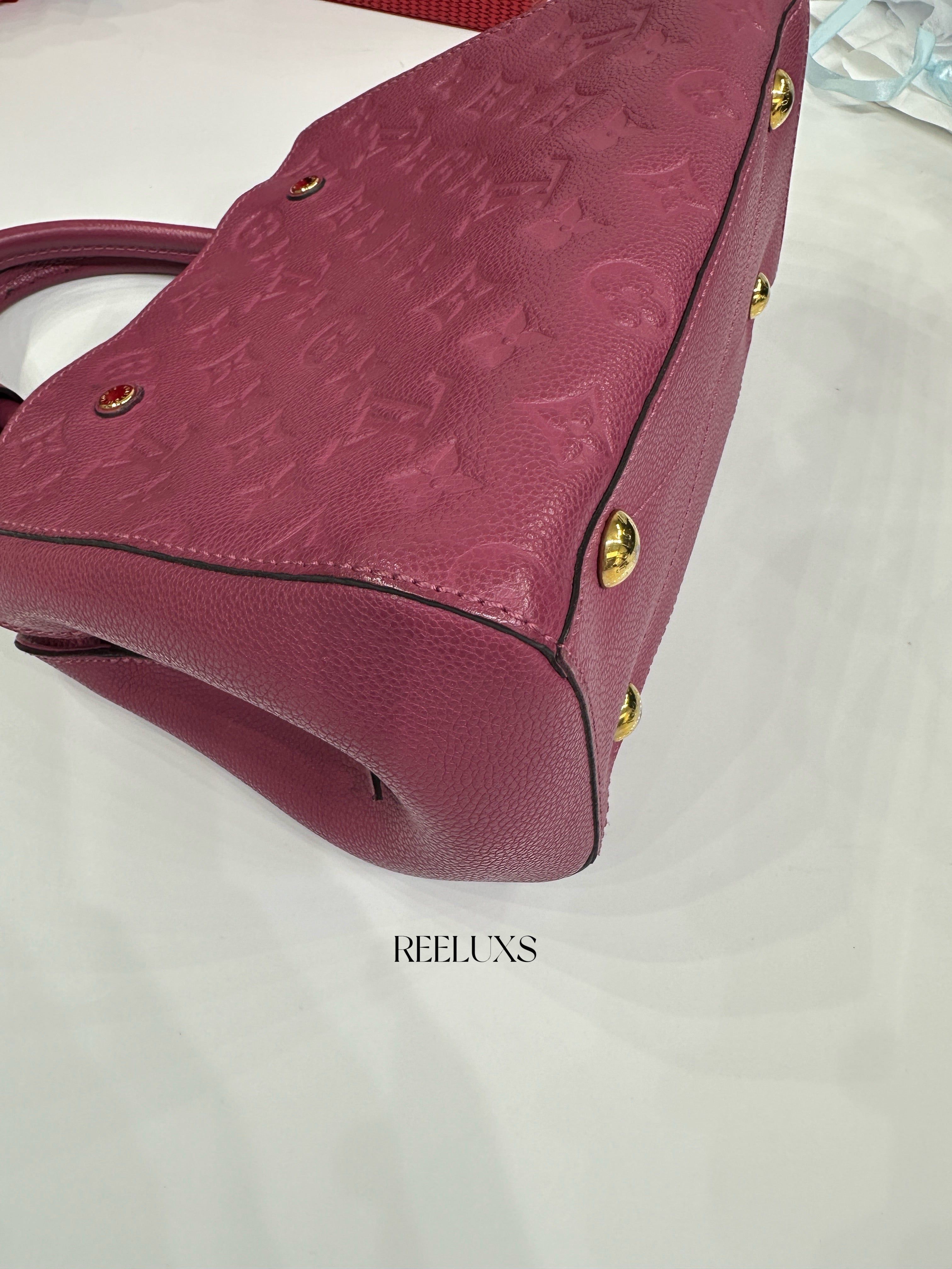 Louis Vuitton LV  Montaigne Bag crafted Monogram Empreinte leather