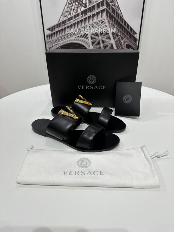 VERSACE
Black Virtus Flat Sandals - Reeluxs 