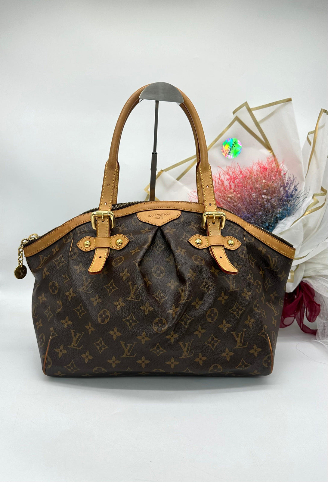 LOUIS VUITTON 
Monogram Tivoli GM Brown - Reeluxs 