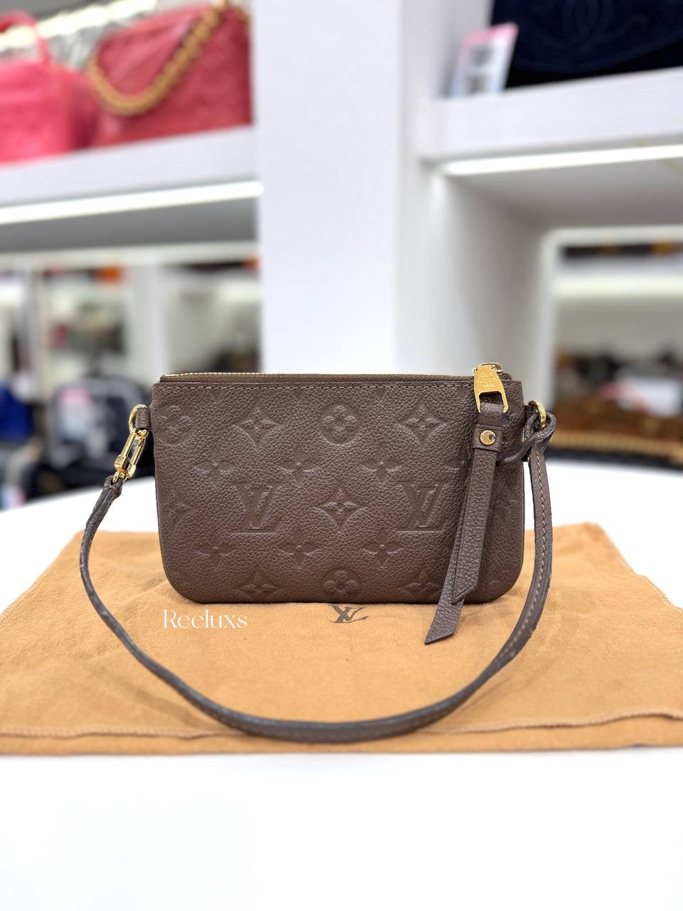 LOUIS VUITTON Terre Monogram Empreinte Citadine Pochette