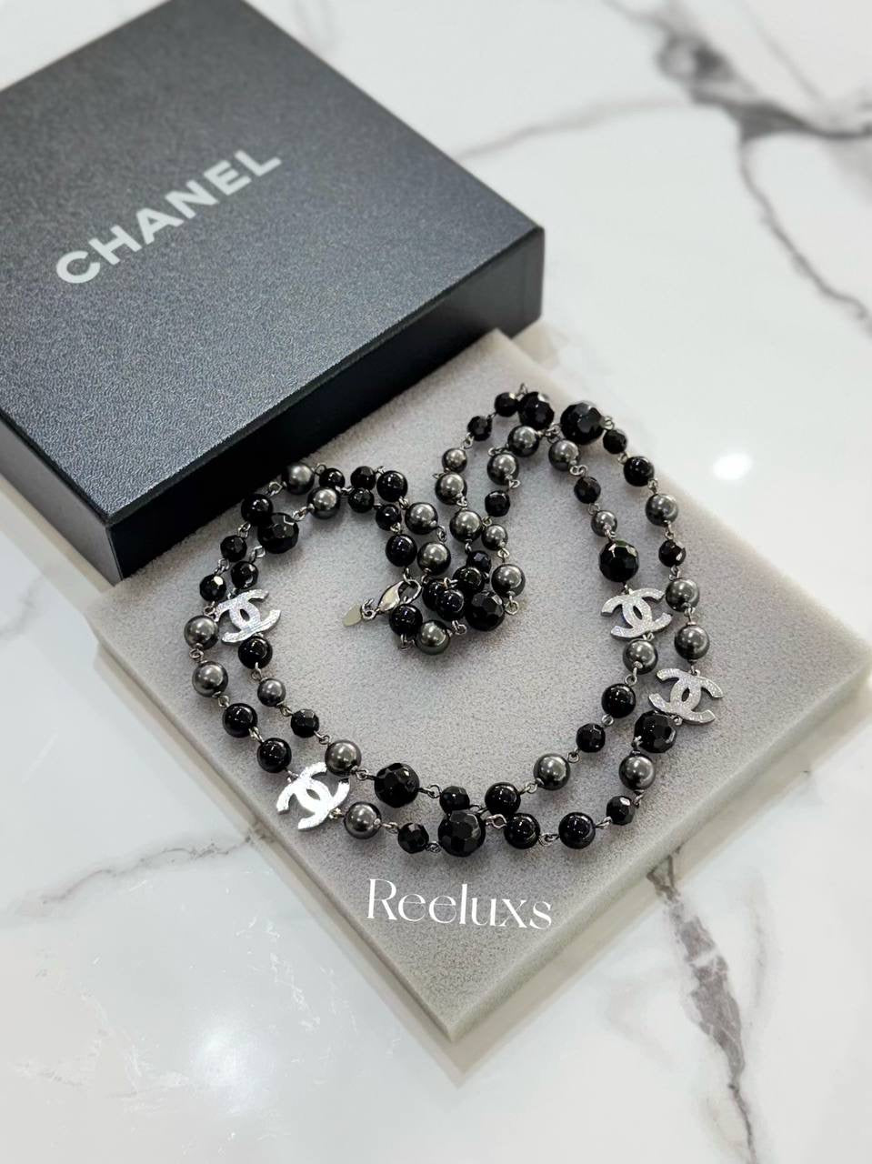 CHANEL Black And Grey Beaded Triple CC Long Necklace