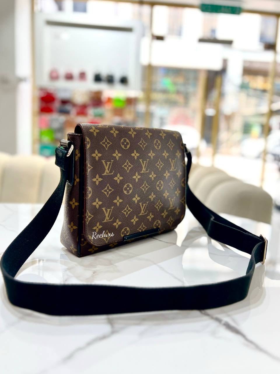 LOUIS VUITTON LV Monogram District PM Brown Messenger Bags
