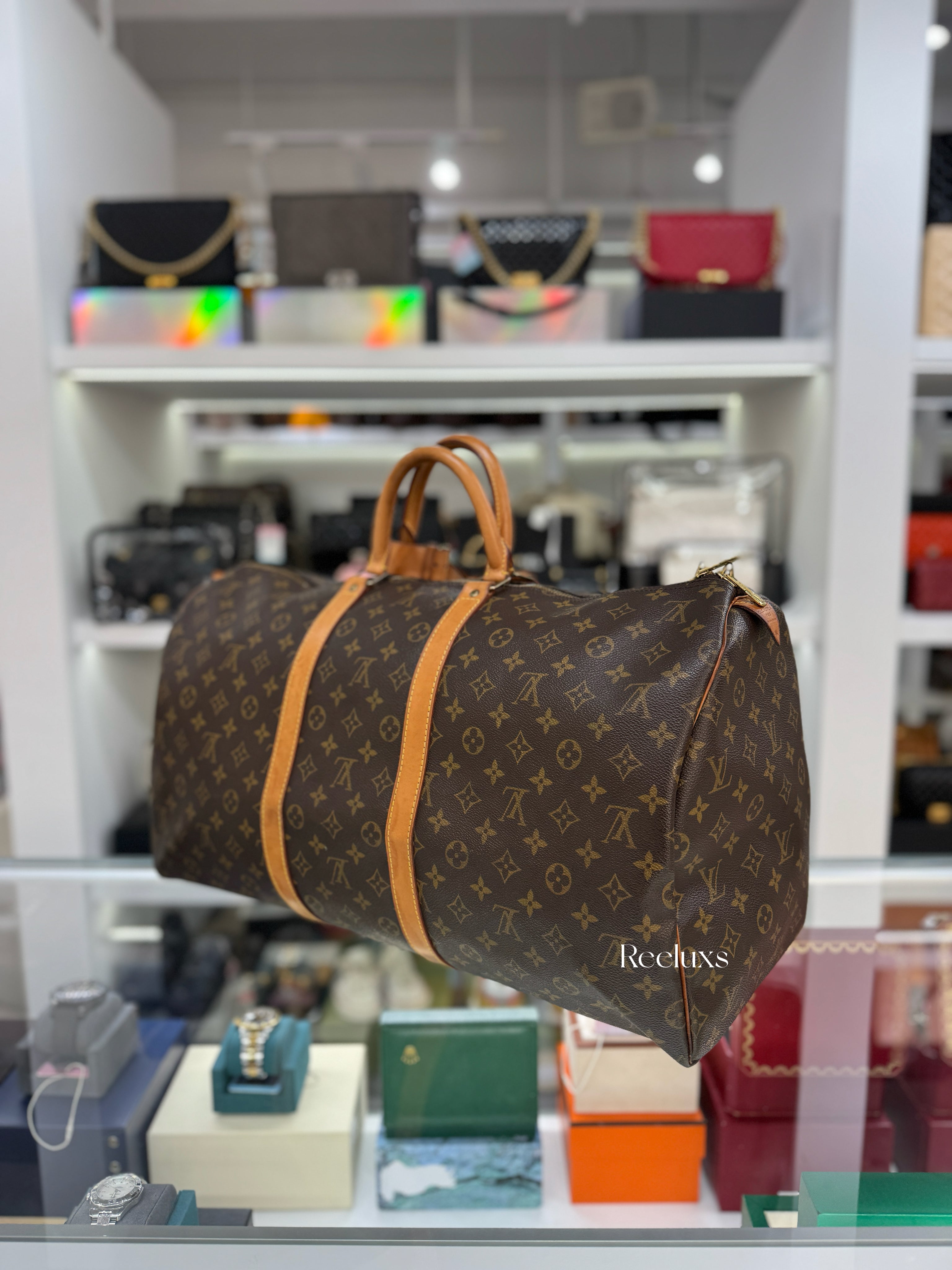 LOUIS VUITTON Keepall 55 Bandoulière Travel Bag