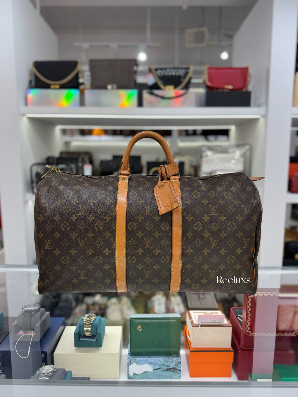 LOUIS VUITTON Keepall 55 Bandoulière Travel Bag
