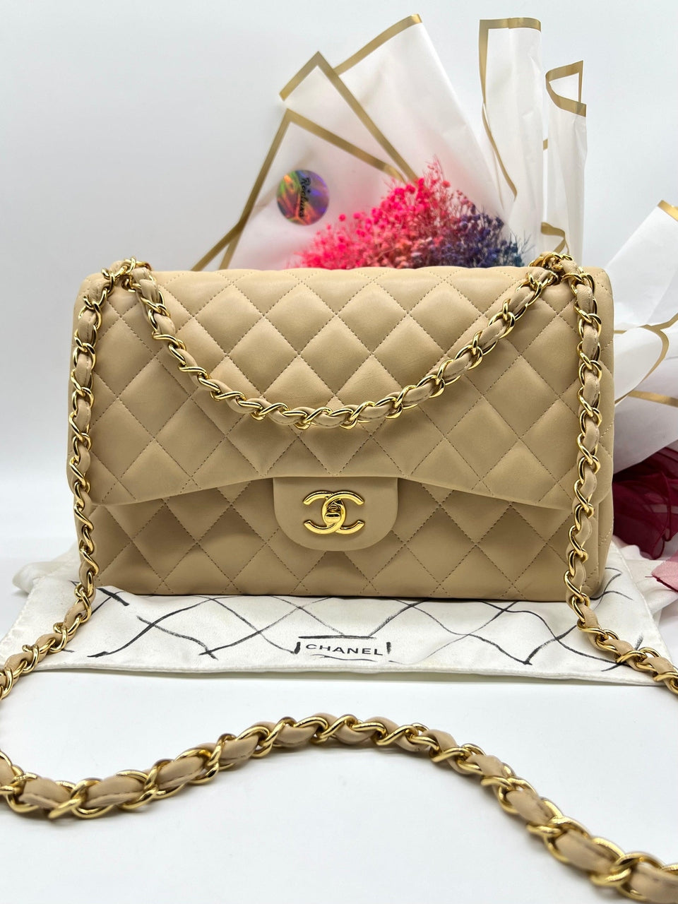 CHANEL Beige Lambskin Jumbo Classic Flap - Reeluxs 