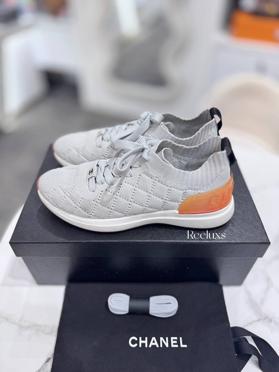 Chanel Quilted Low-Top Sneakers in White Wool