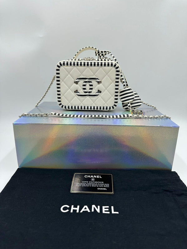 Chanel Filigree Small Vanity Case in White Caviar, Black and White Trims - Reeluxs 