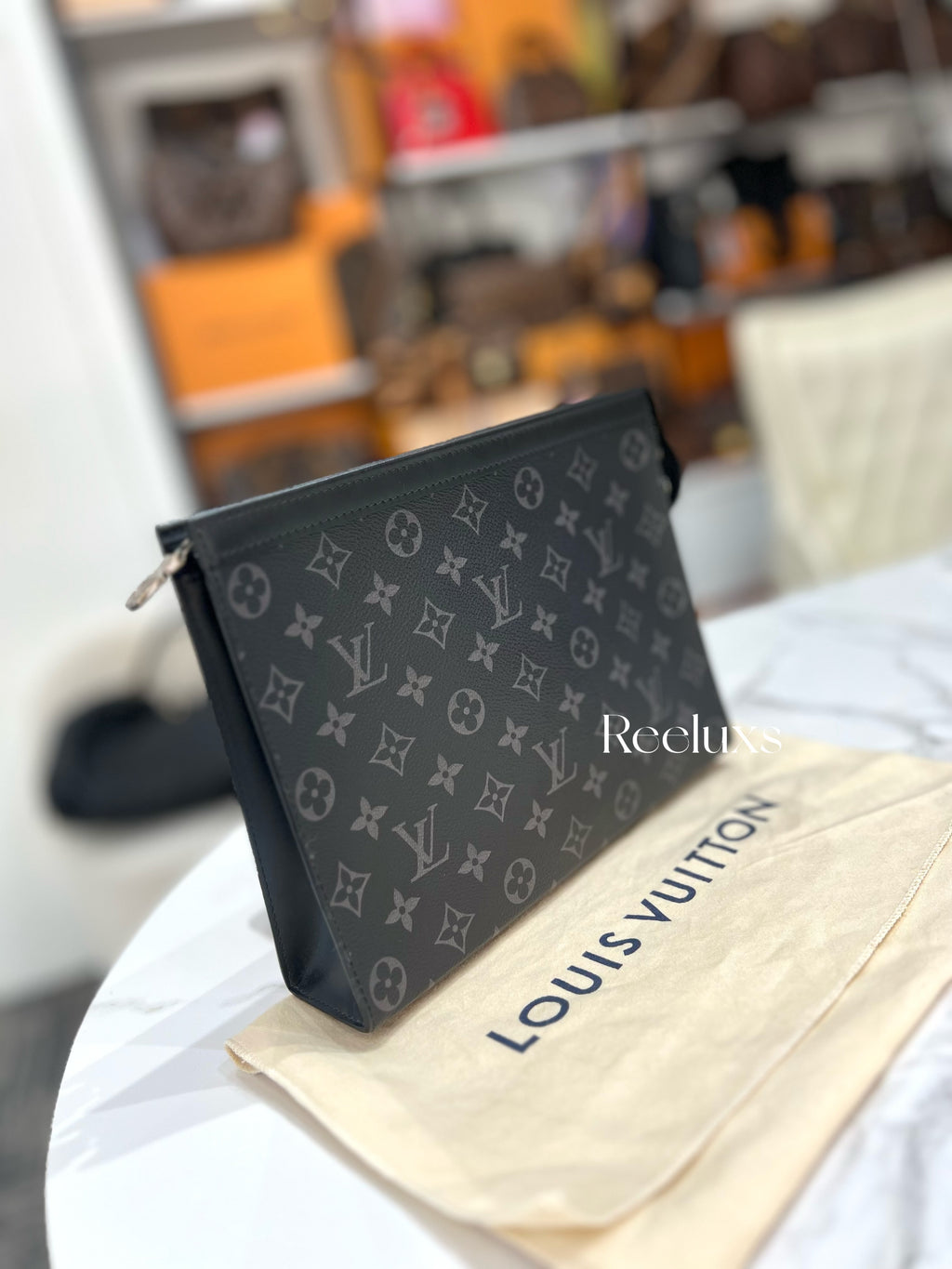 LOUIS VUITTON Pochette Voyage MM in Monogram Eclipse Canvas