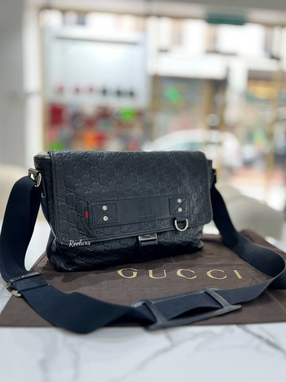 GUCCI Black Guccissima Crossbody Bag