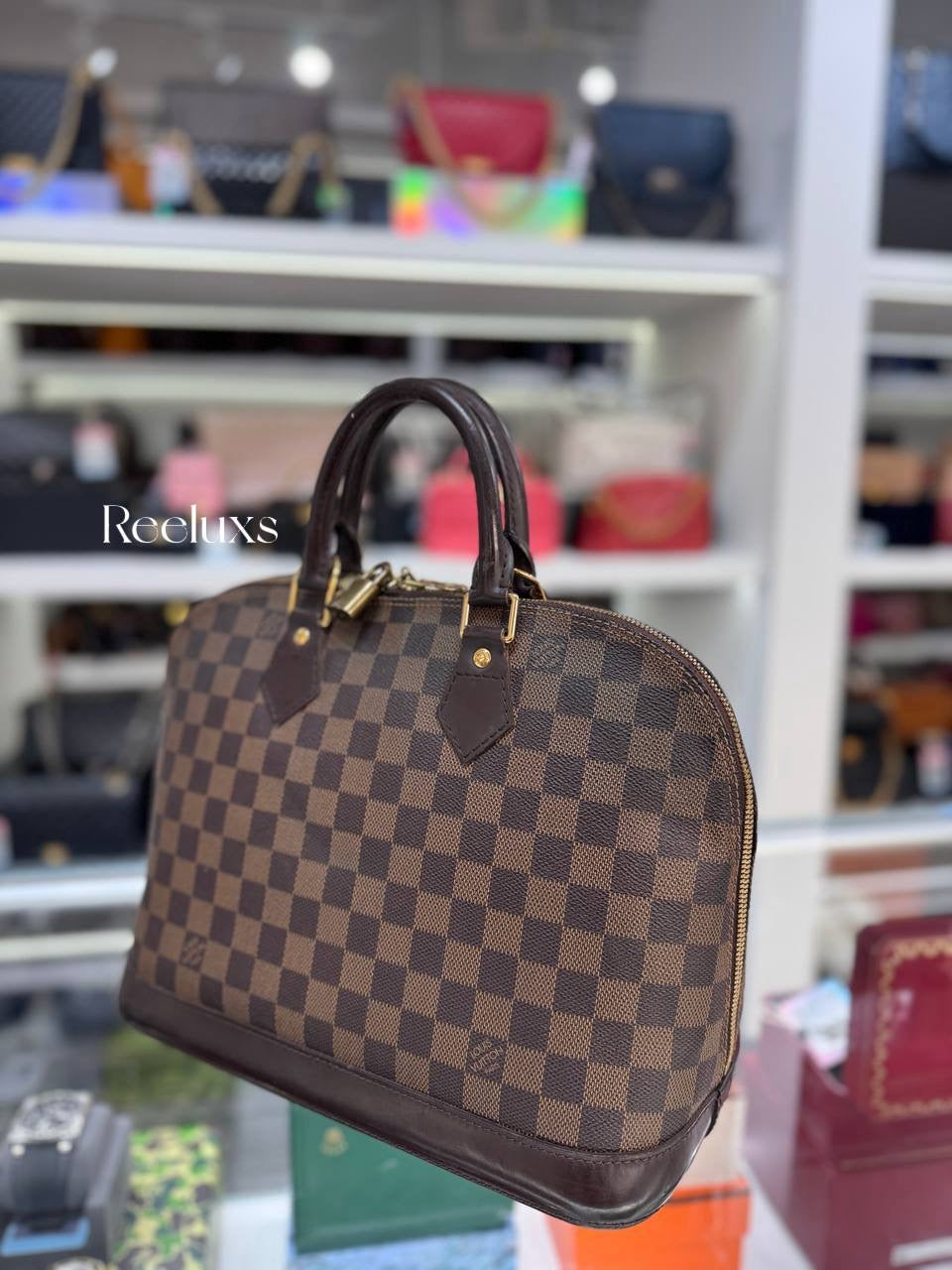 LOUIS VUITTON Alma PM Handbag in Damier Ebene Coated Canvas