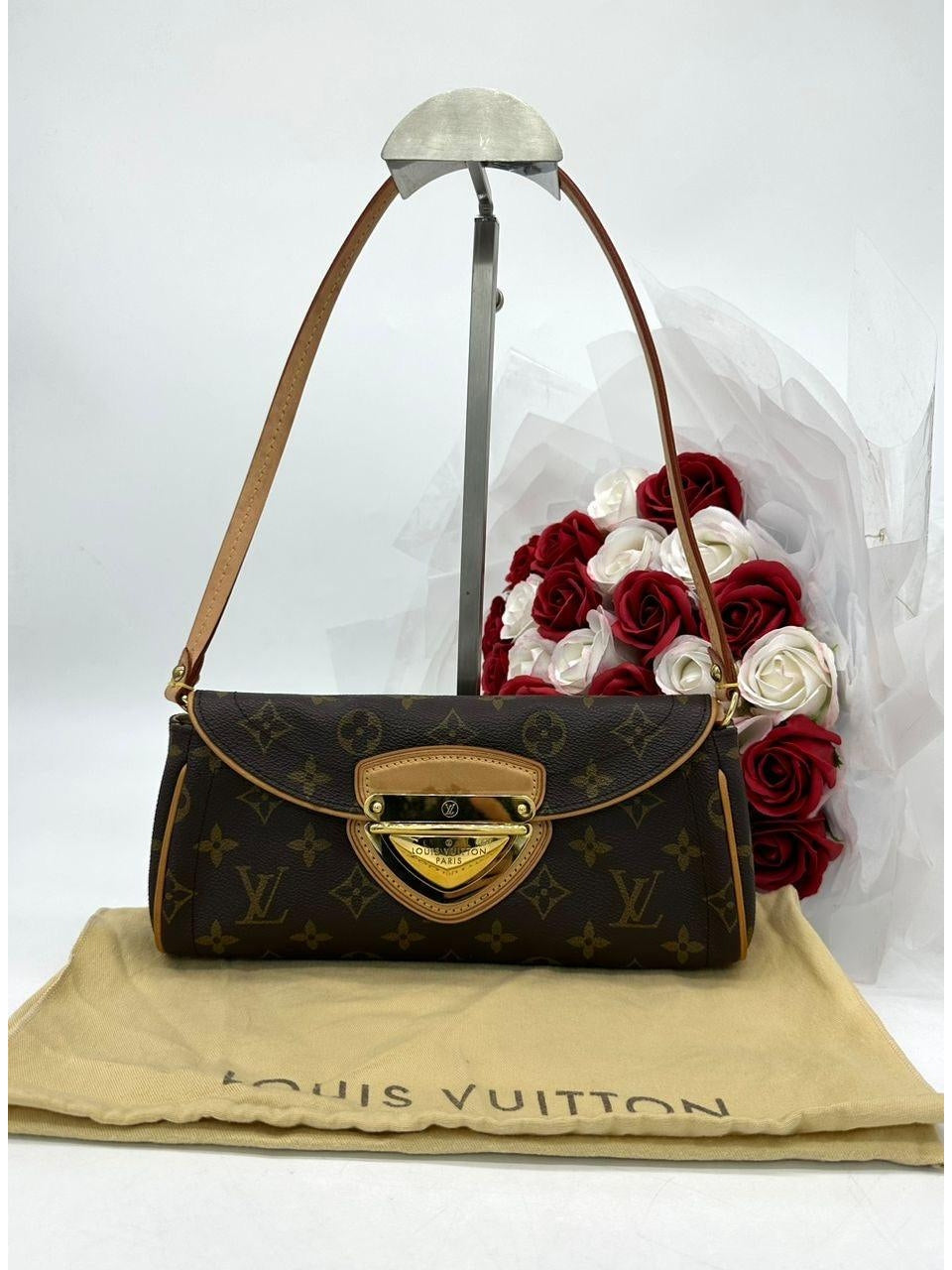 Louis Vuitton
Brown Monogram Beverly Pochette Bag - Reeluxs 