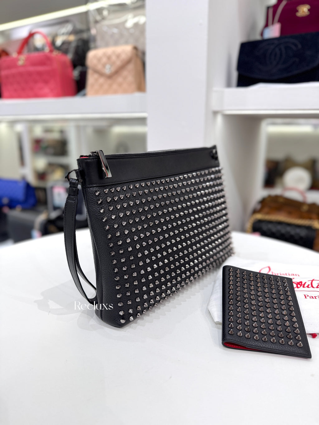 CHRISTIAN LOUBOUTINE Funky Spiked Leather Pouch In Black