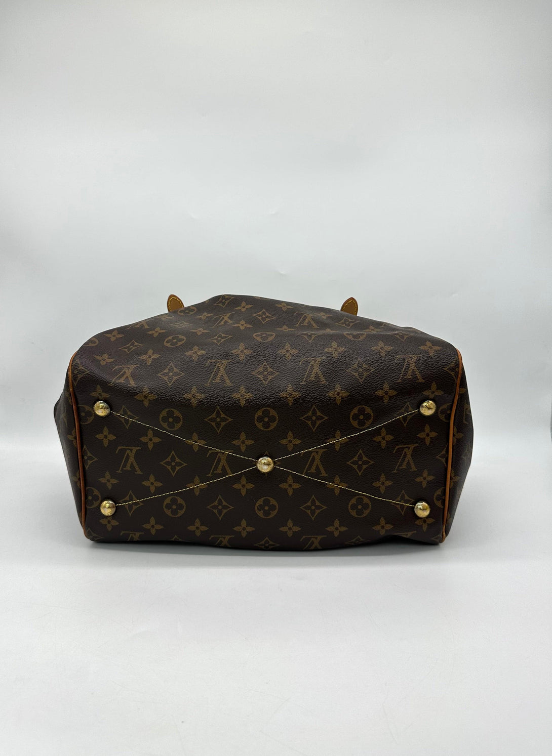 LOUIS VUITTON 
Monogram Tivoli GM Brown - Reeluxs 