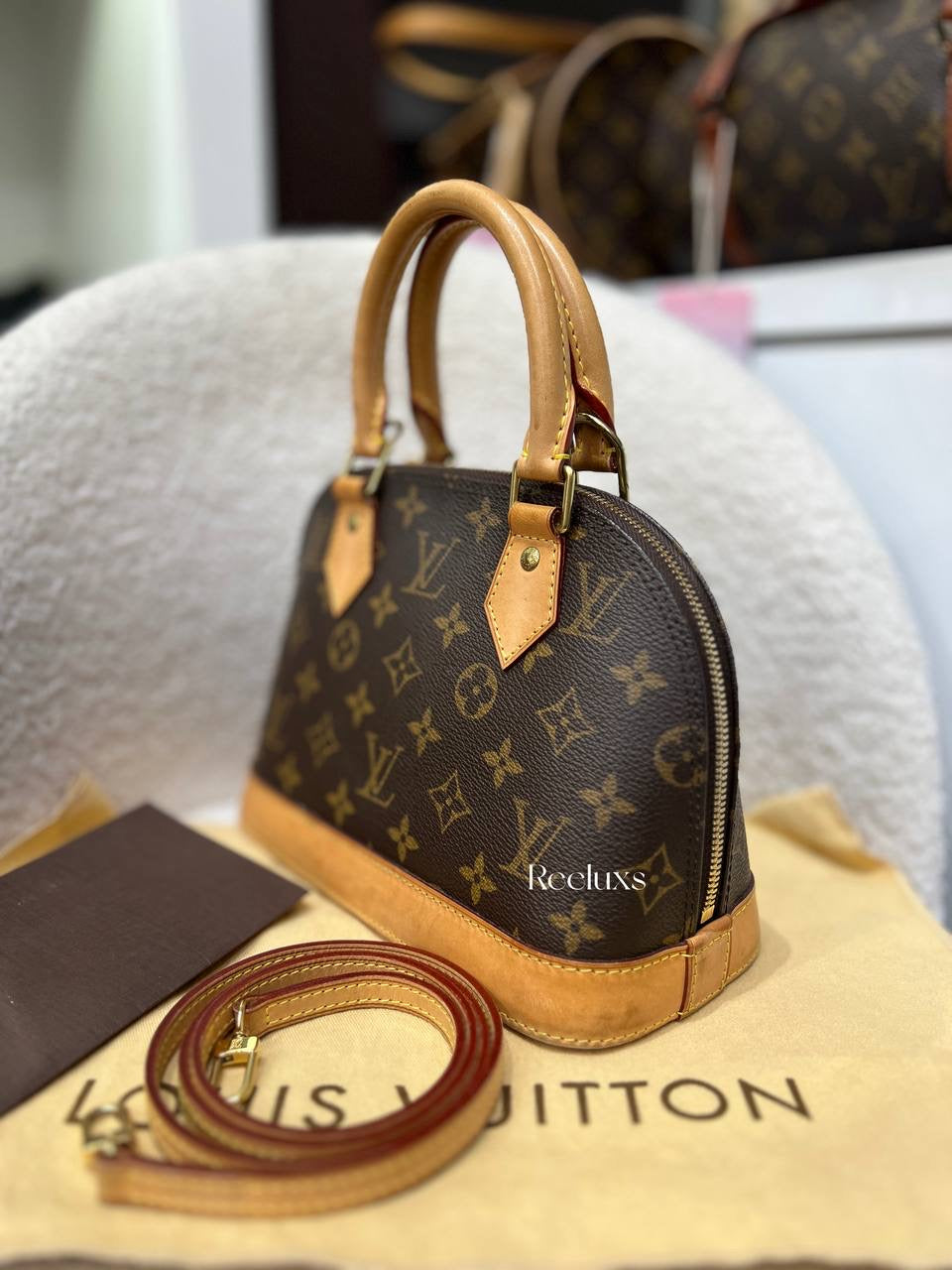 LOUIS VUITTON Alma BB Handbag Iconic Monogram Canvas