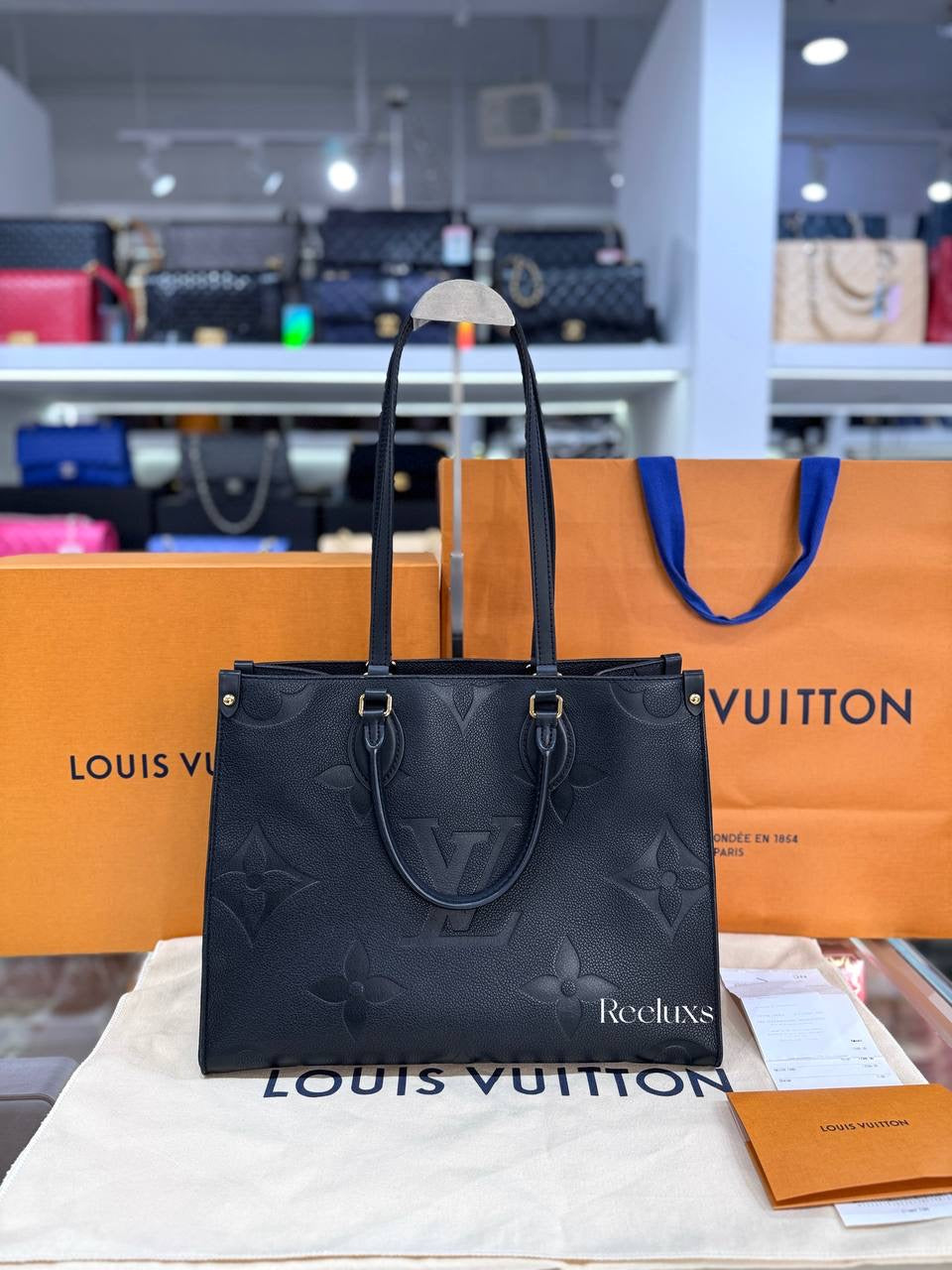 LOUIS VUITTON OnTheGo MM Black Monogram Empreinte Leather