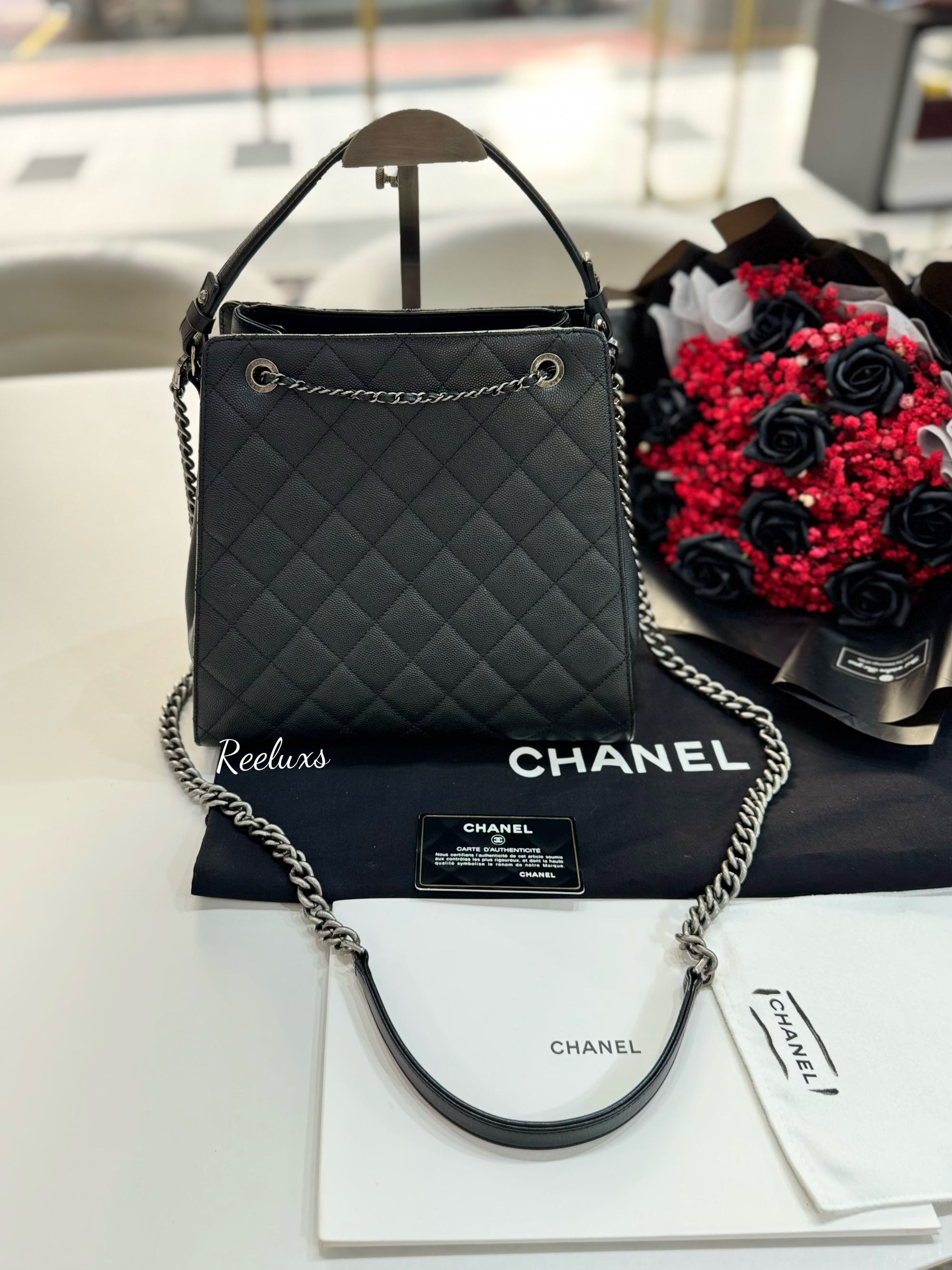 CHANEL Black Quilted
Caviar Leather CC Large Accordion Bucket Bag