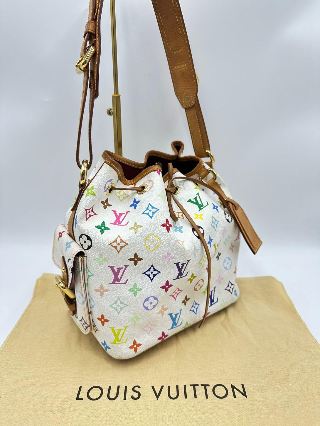 LOUIS VUITTON
Limited Edition Takashi Murakami X White Monogram Multicolore Noe Petite MM - Reeluxs 