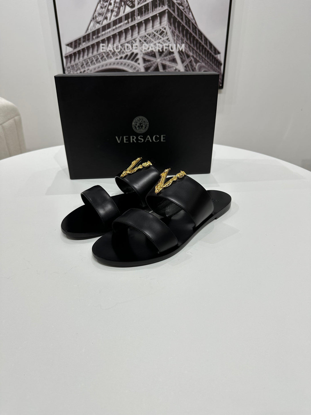 VERSACE
Black Virtus Flat Sandals - Reeluxs 