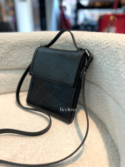 GUCCI GG Embossed Messenger Bag