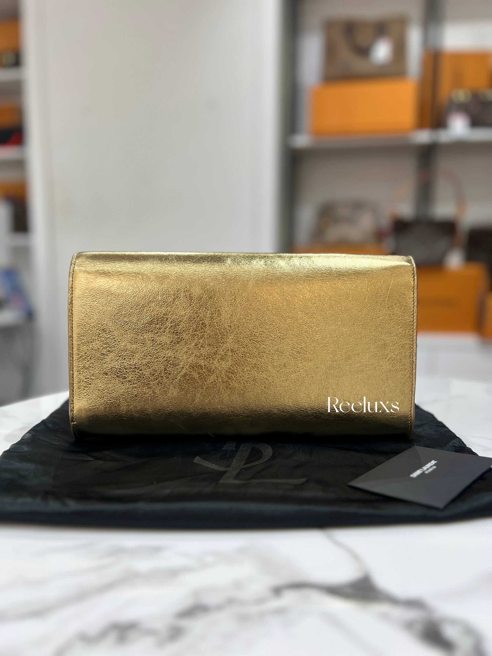 SAINT LAURENT De JOUR Clutch  Metallic Gold Leather