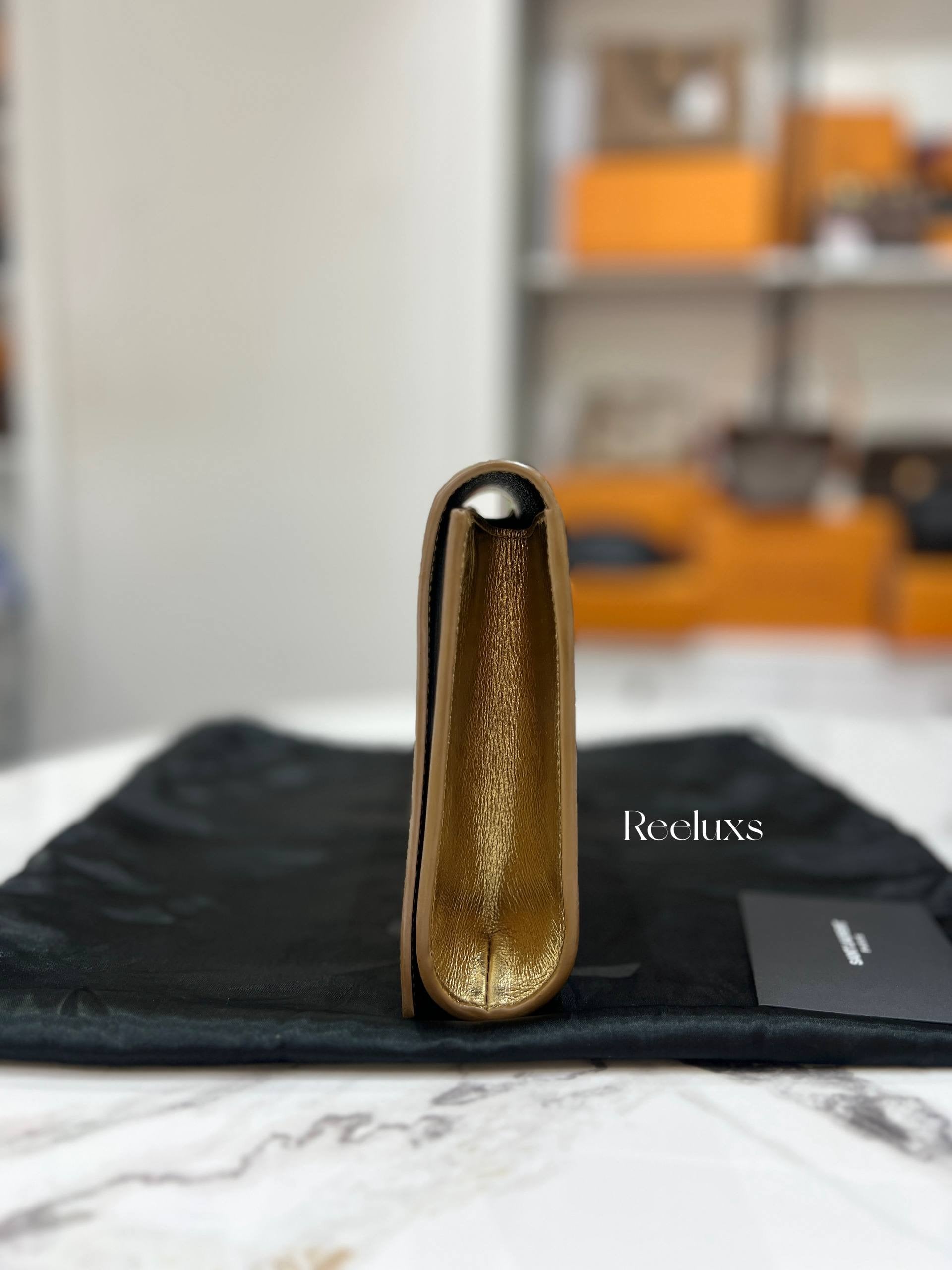 SAINT LAURENT De JOUR Clutch  Metallic Gold Leather