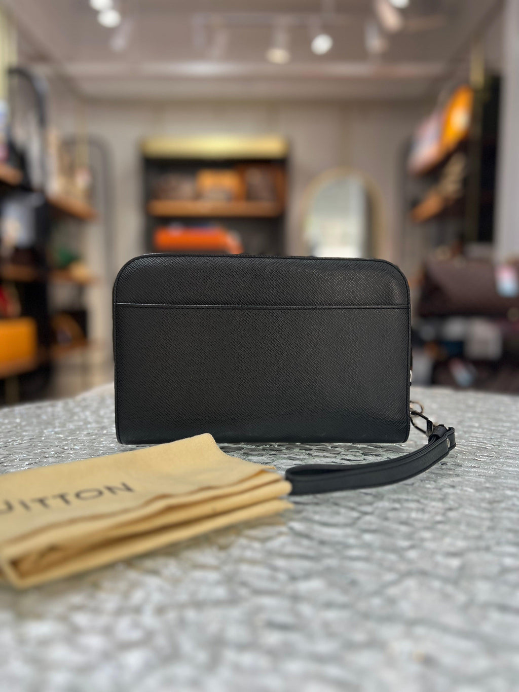 Louis Vuitton Taiga Baikal 
Men's Clutch - Reeluxs 