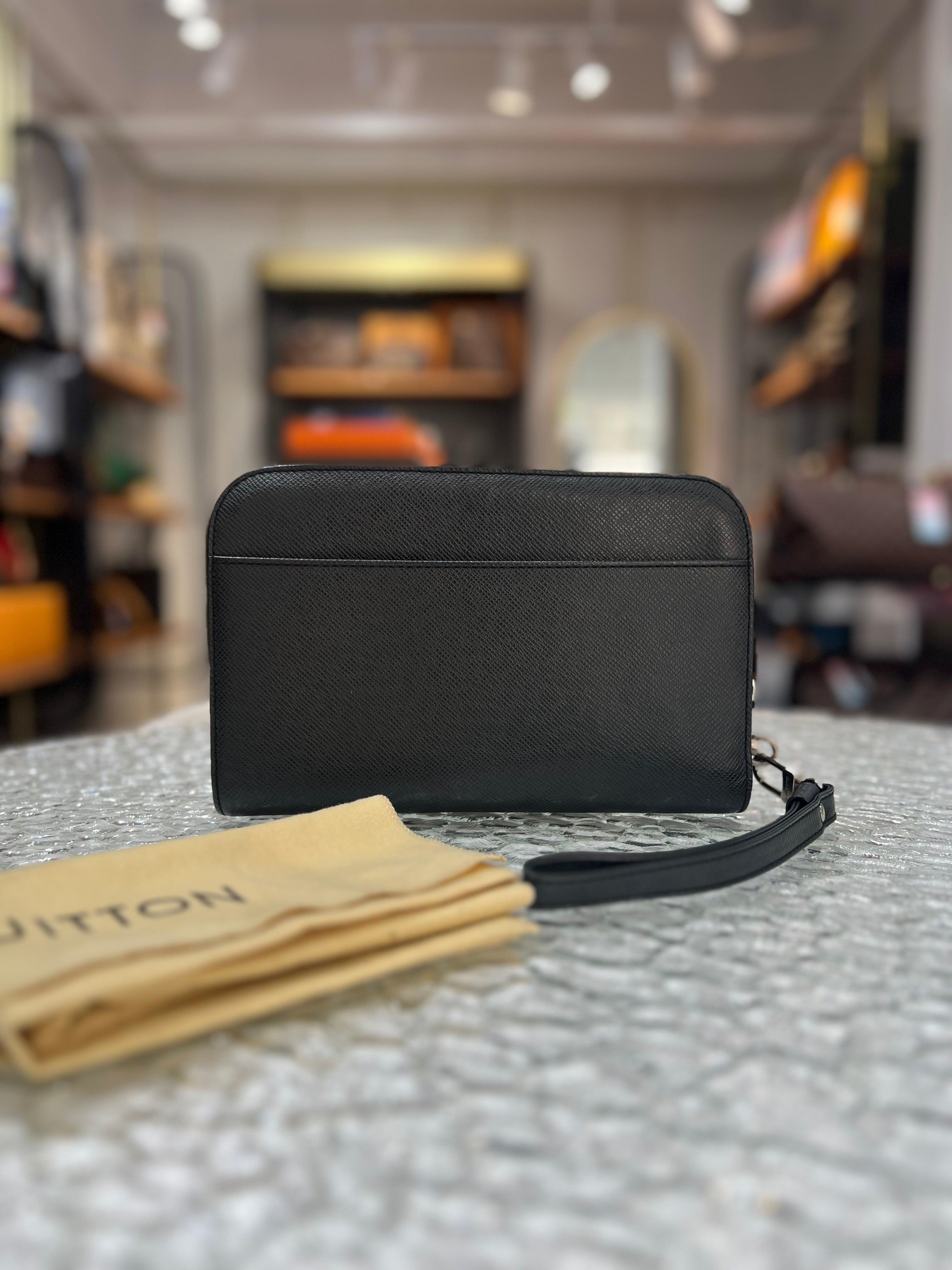 Louis Vuitton Taiga Baikal 
Men's Clutch - Reeluxs 