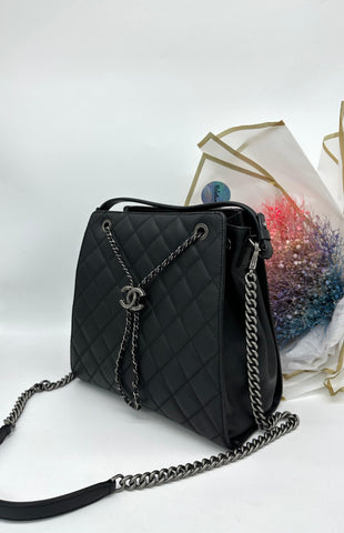 CHANEL Black Quilted
Caviar Leather CC Large Accordion Bucket Bag - Reeluxs 