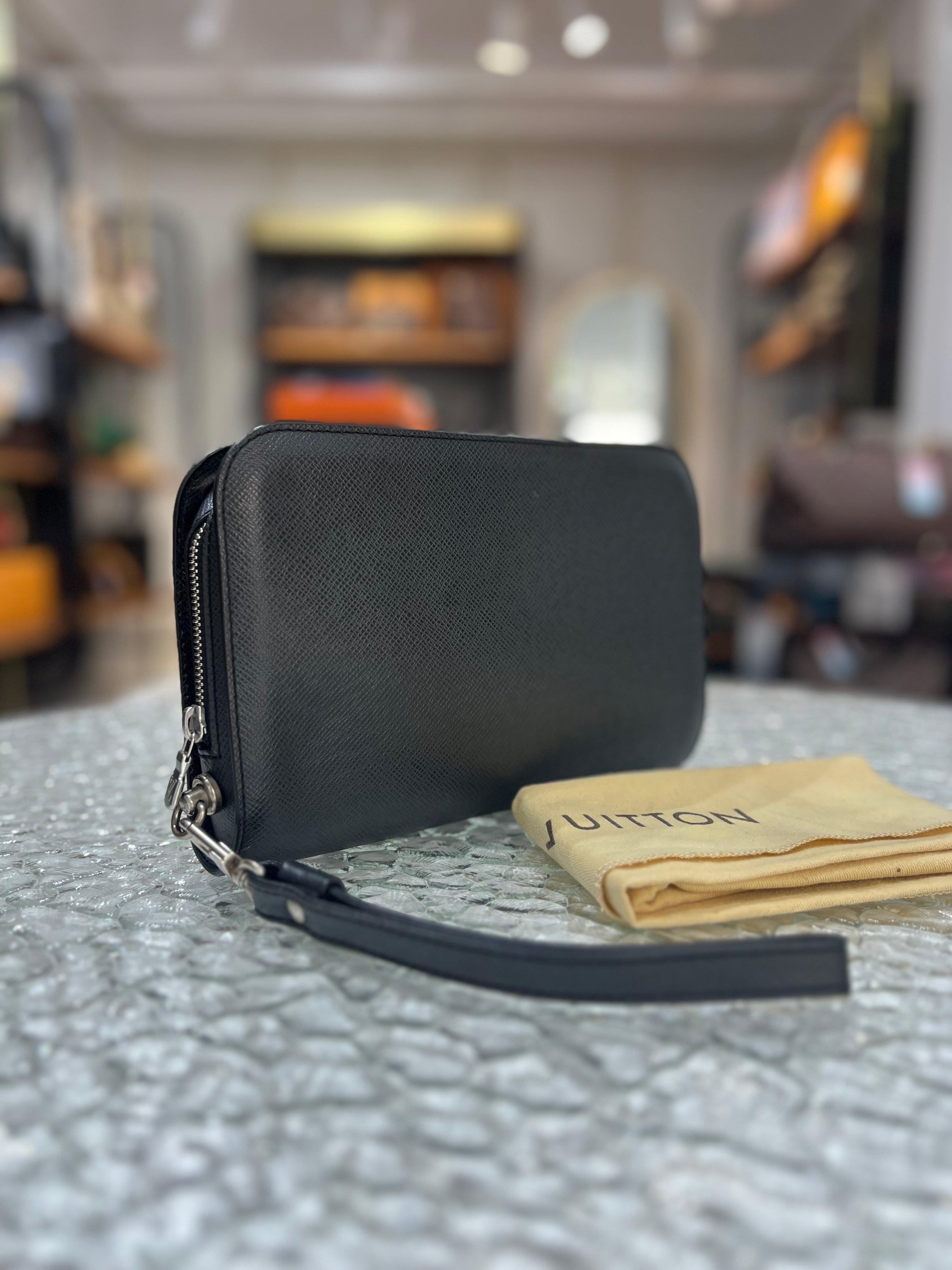 Louis Vuitton Taiga Baikal 
Men's Clutch - Reeluxs 