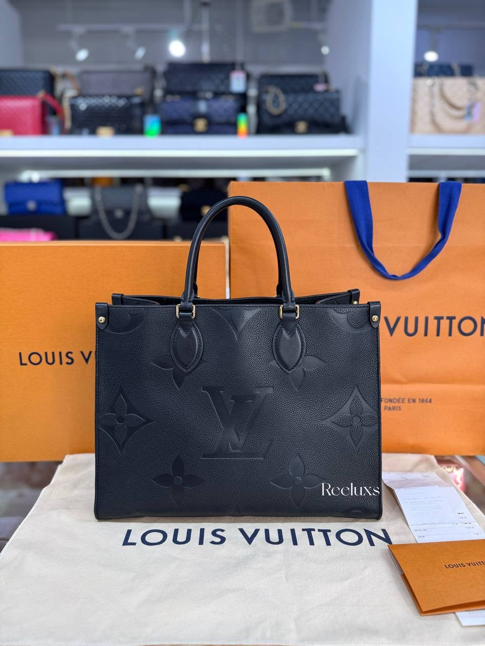 LOUIS VUITTON OnTheGo MM Black Monogram Empreinte Leather
