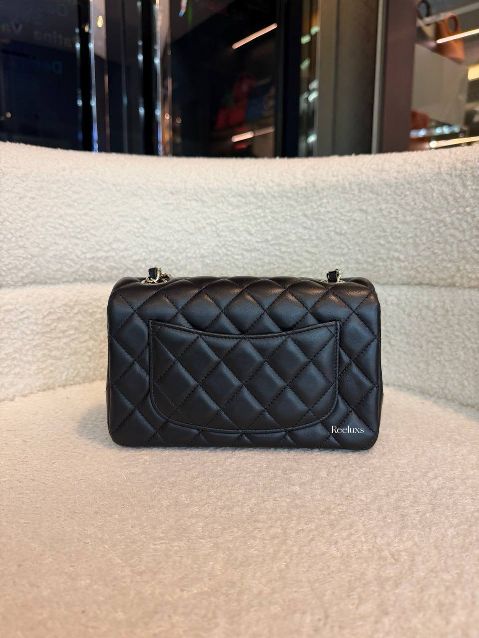 Chanel Classic Mini Flap Bag in black lambskin leather