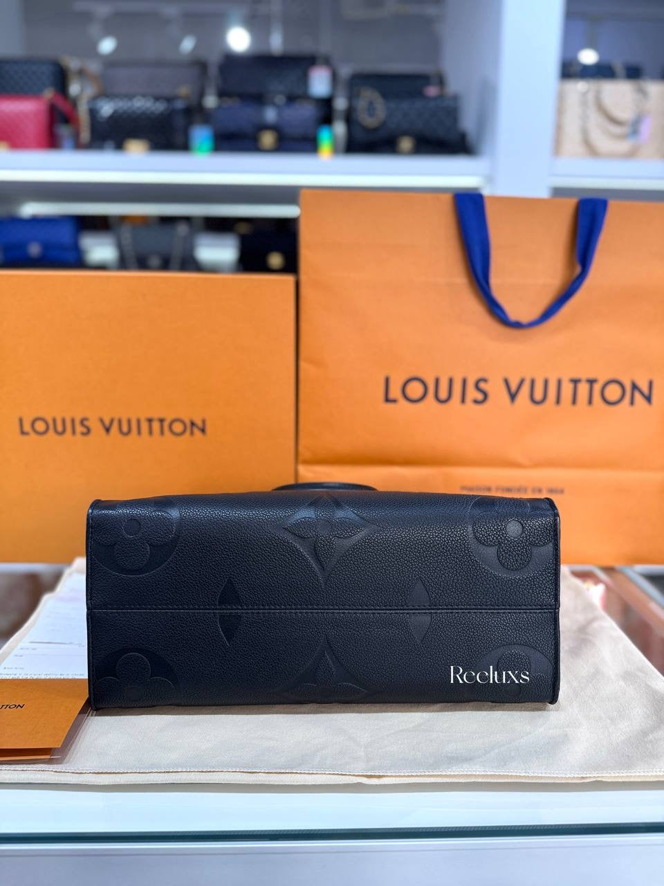LOUIS VUITTON OnTheGo MM Black Monogram Empreinte Leather