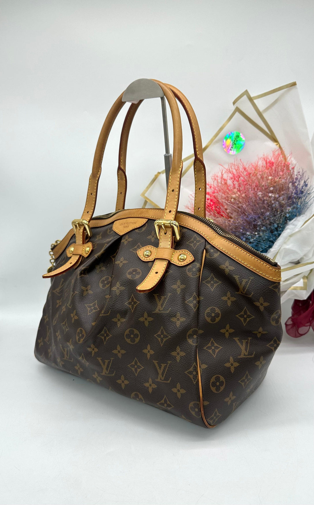 LOUIS VUITTON 
Monogram Tivoli GM Brown - Reeluxs 