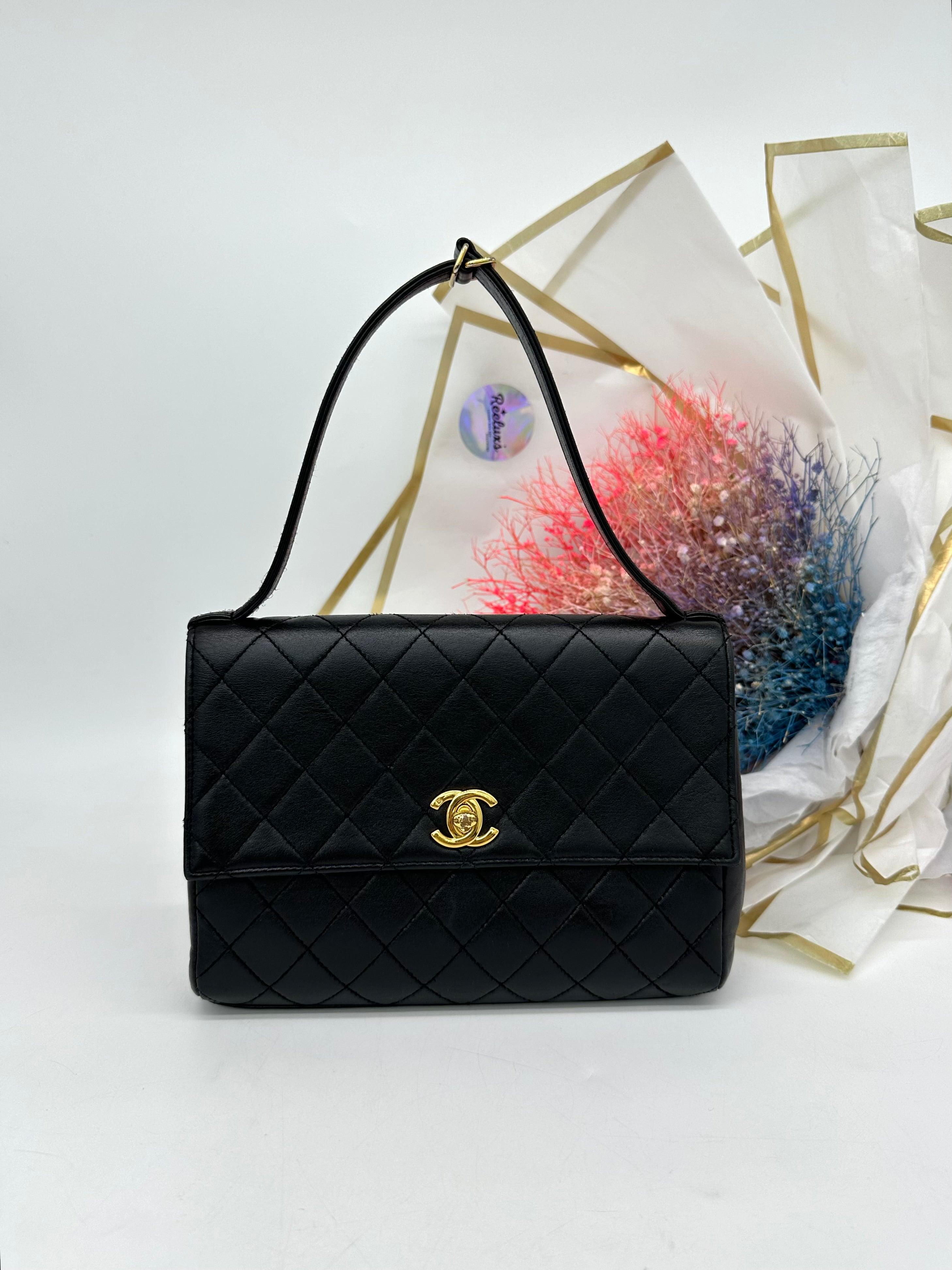 CHANEL Black Quilted Lambskin Vintage Classic Top Handle Clutch - Reeluxs 