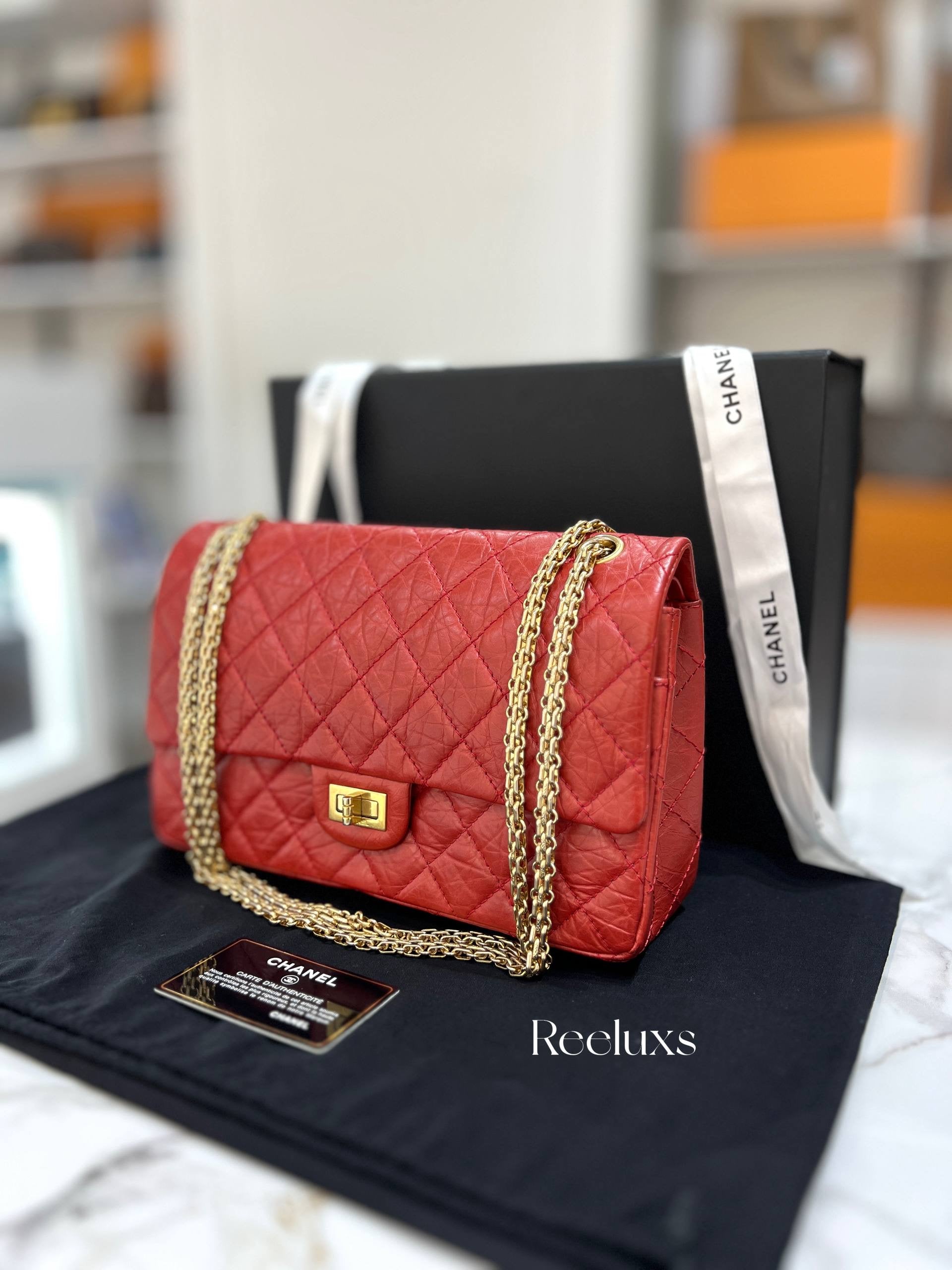 CHANEL Red Quilted Aged Leather Reissue 2.55 Classic Flap Bag GHW