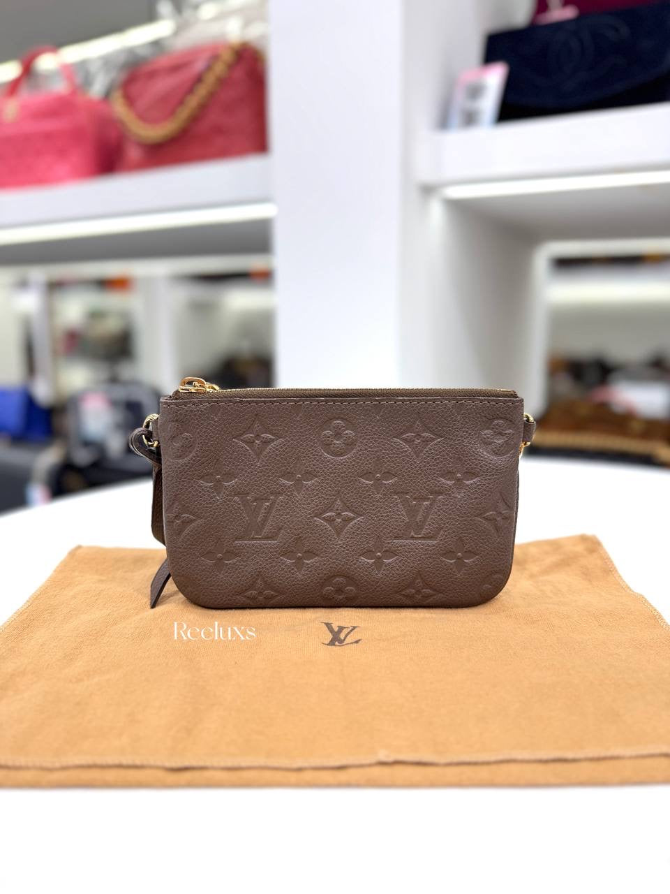 LOUIS VUITTON Terre Monogram Empreinte Citadine Pochette