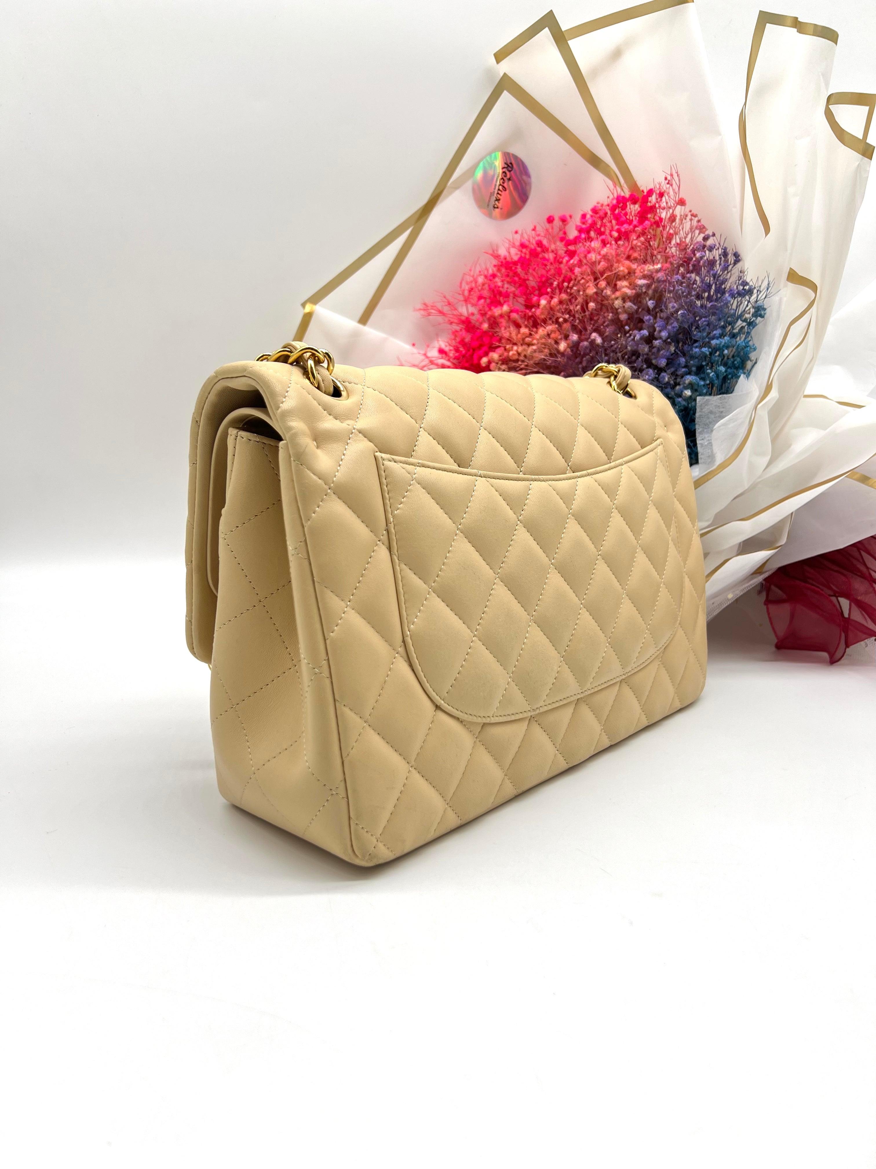 CHANEL Beige Lambskin Jumbo Classic Flap - Reeluxs 