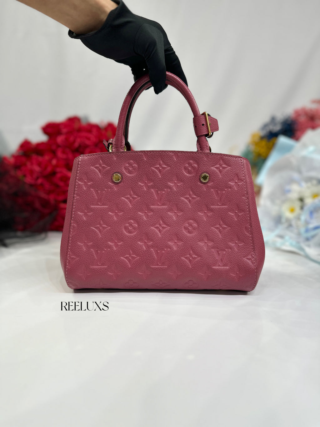 Louis Vuitton LV  Montaigne Bag crafted Monogram Empreinte leather