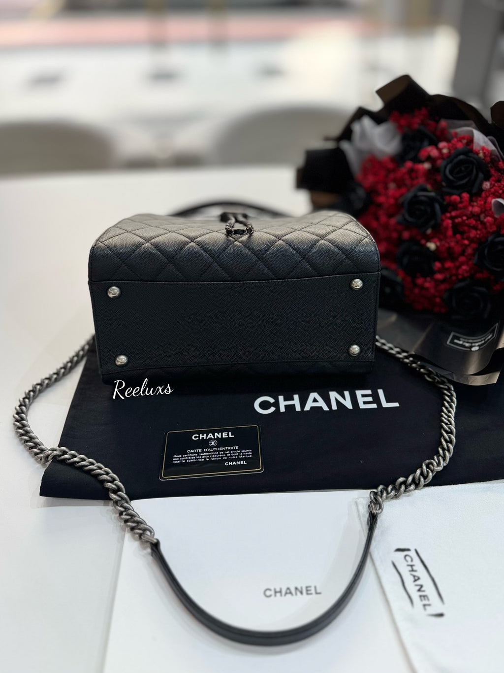 CHANEL Black Quilted
Caviar Leather CC Large Accordion Bucket Bag