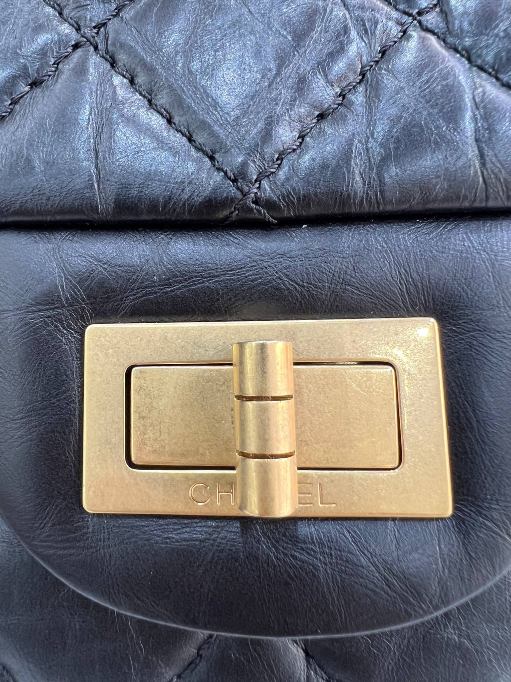 CHANEL 2.55 Reissue Double Flap Bag In Black Aged Calfskin