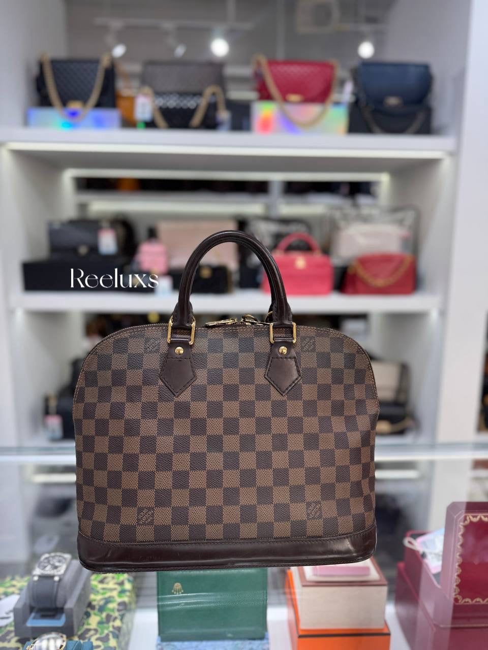 LOUIS VUITTON Alma PM Handbag in Damier Ebene Coated Canvas