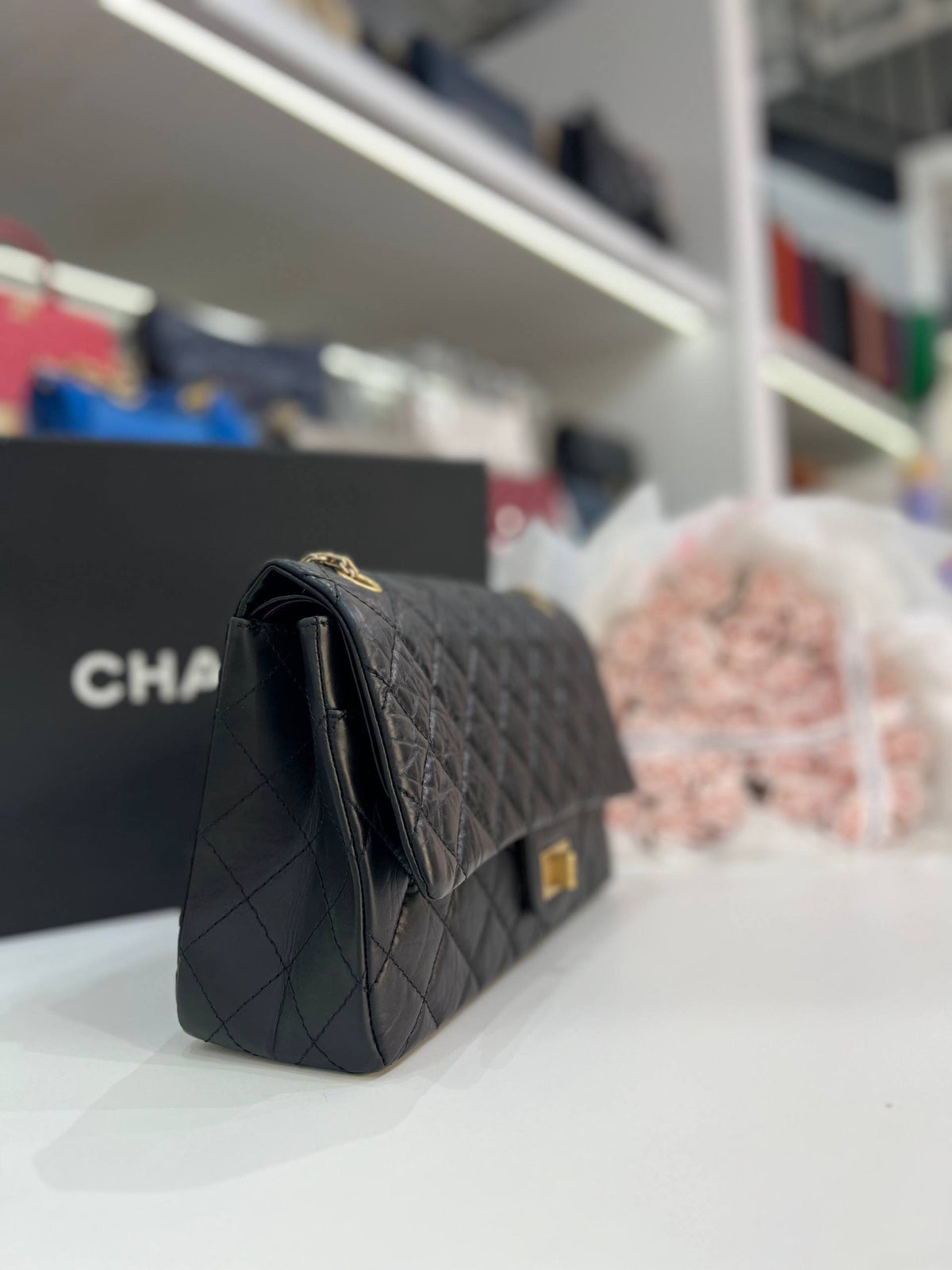 CHANEL 2.55 Reissue Double Flap Bag In Black Aged Calfskin