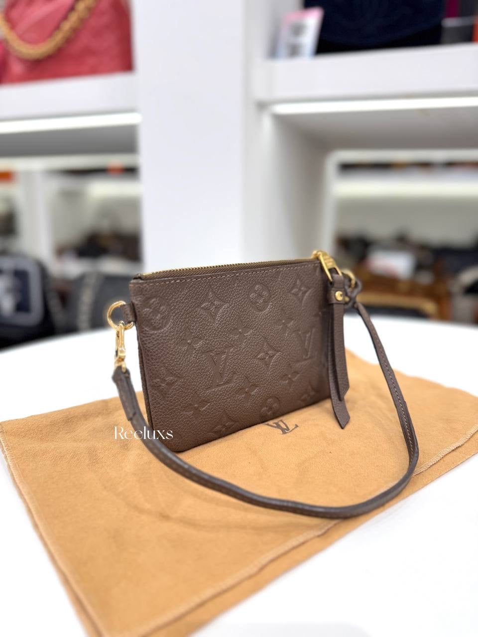 LOUIS VUITTON Terre Monogram Empreinte Citadine Pochette