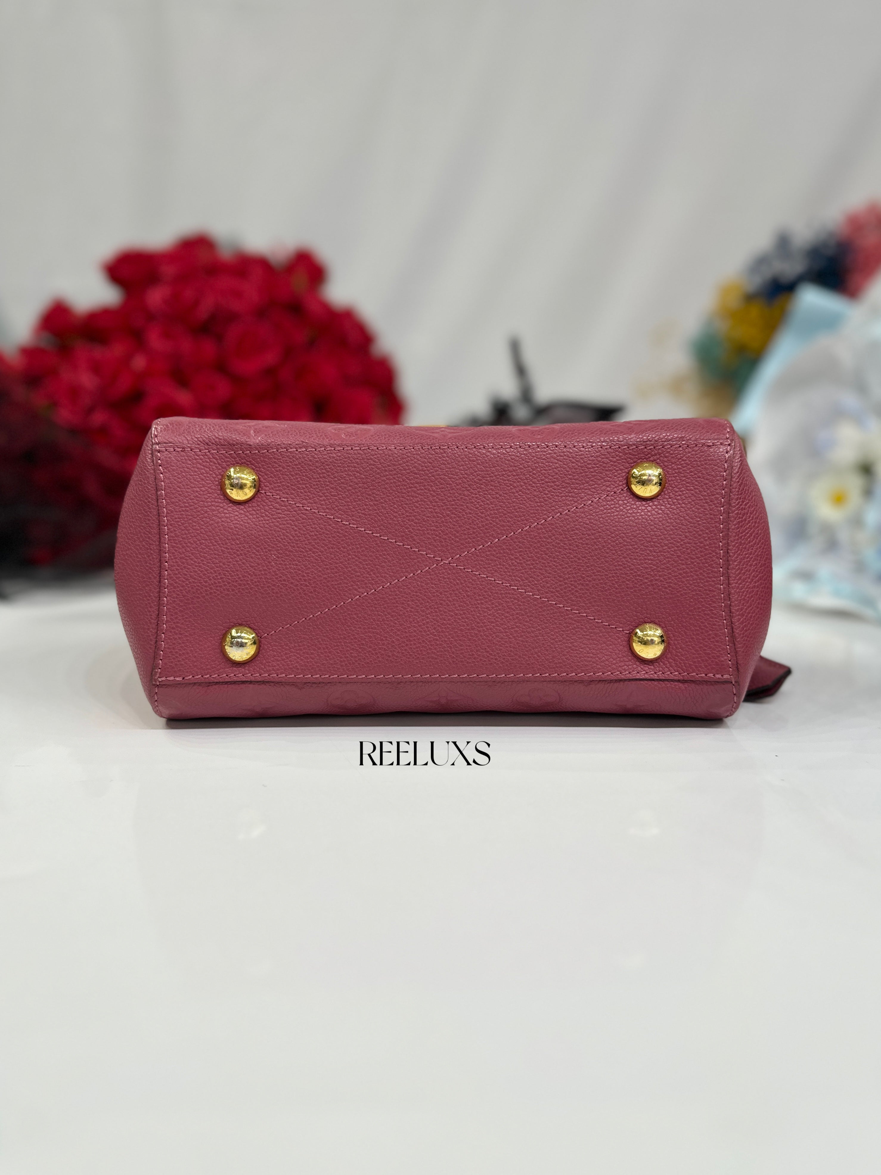 Louis Vuitton LV  Montaigne Bag crafted Monogram Empreinte leather
