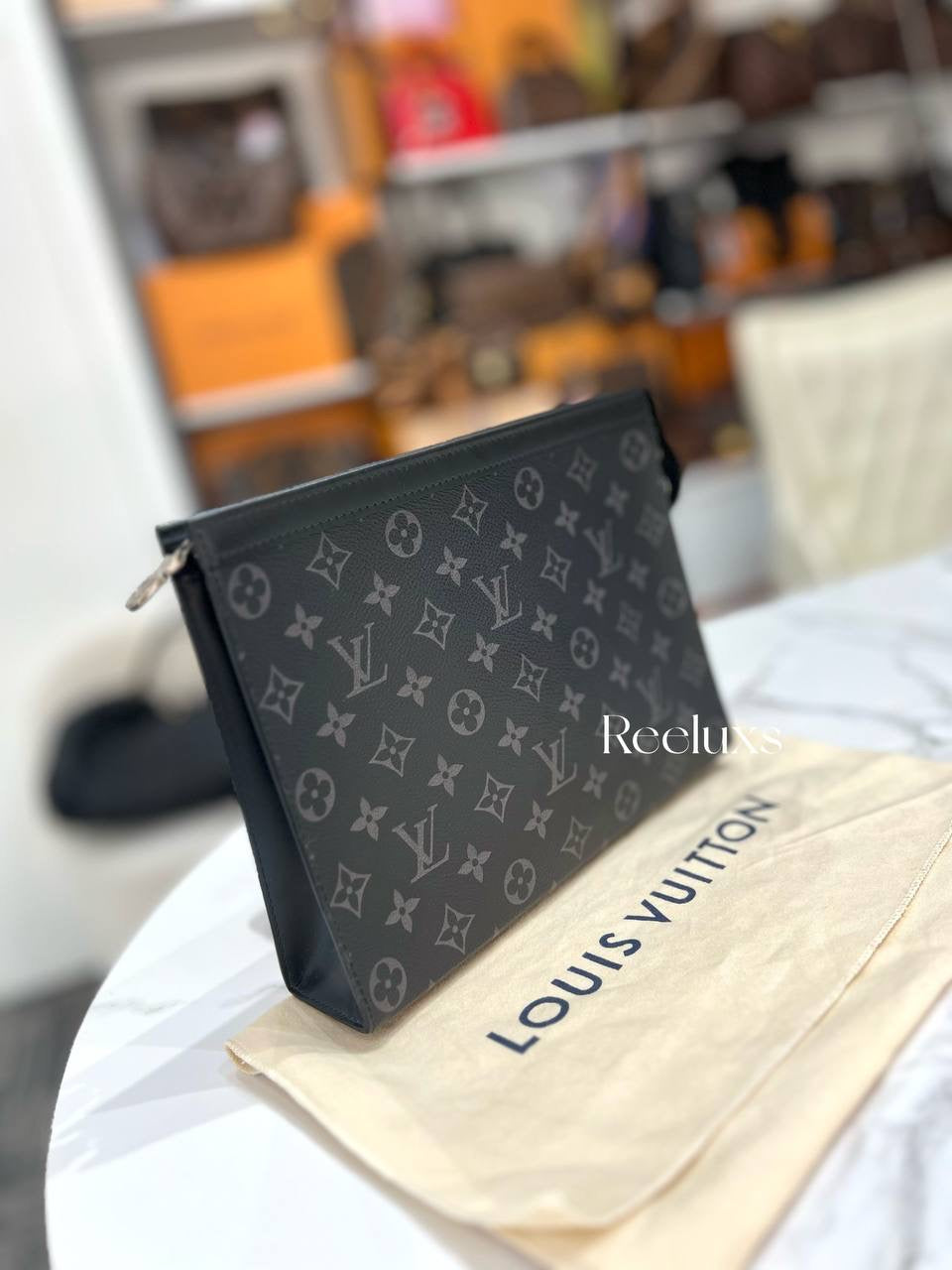 LOUIS VUITTON Pochette Voyage MM in Monogram Eclipse Canvas