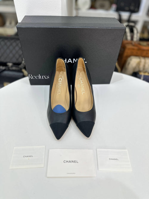 CHANEL Black Leather and Grosgrain Cap-Toe Pumps