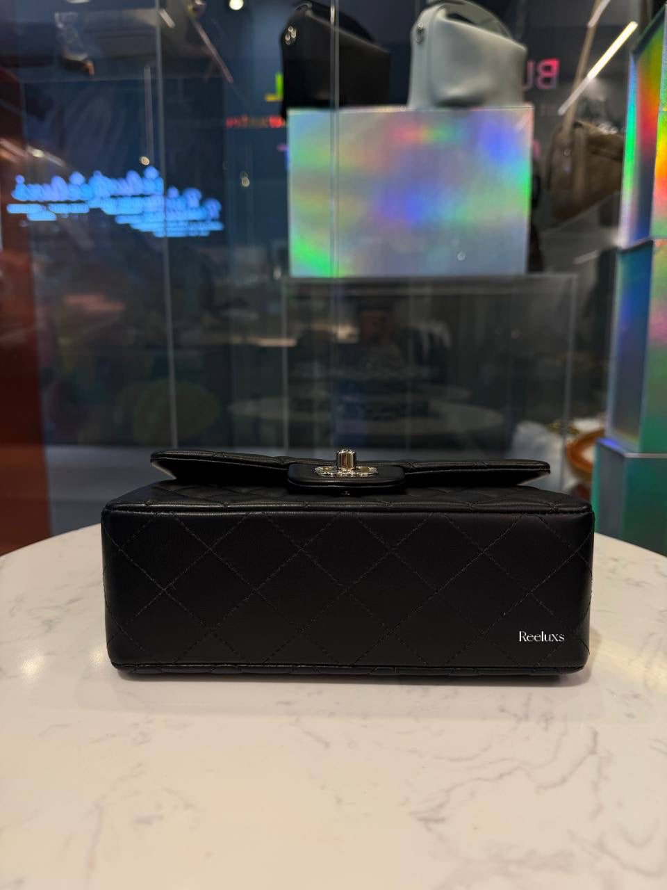 Chanel Classic Mini Flap Bag in black lambskin leather