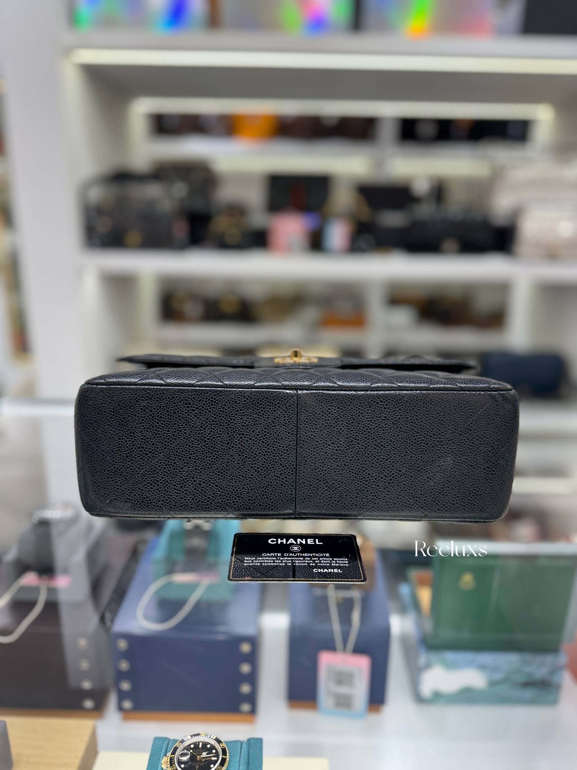 CHANEL Classic Jumbo Flag Bag In Black Quilted Caviar Leather