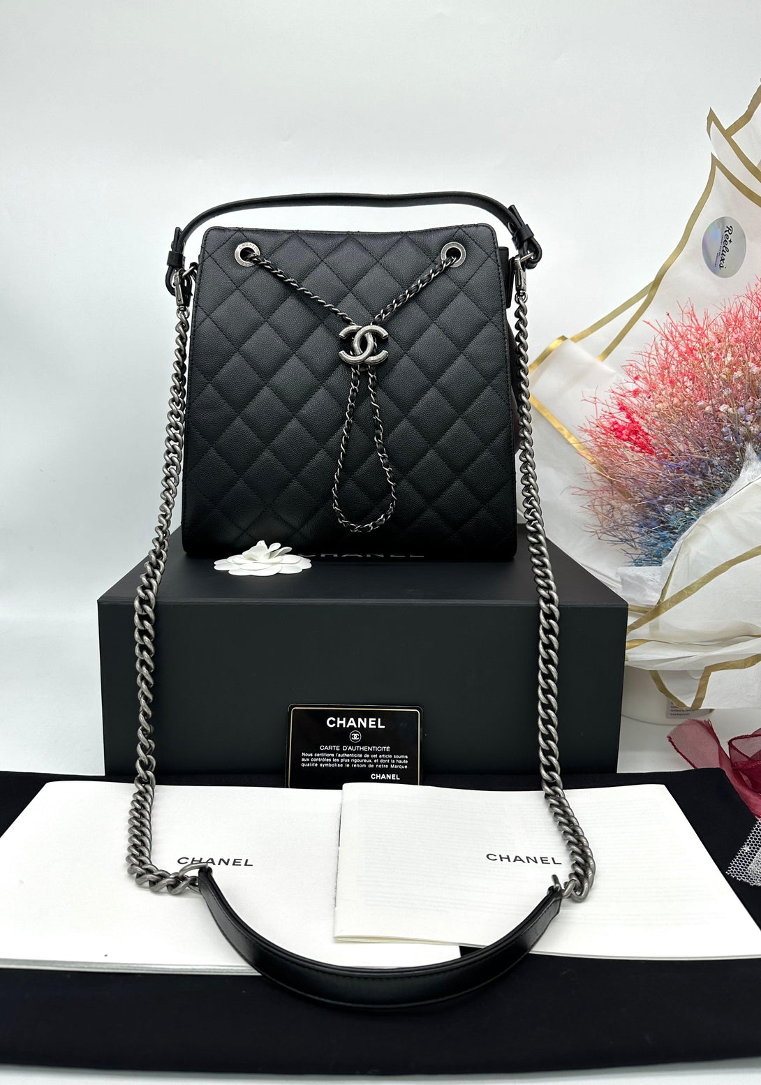 CHANEL Black Quilted
Caviar Leather CC Large Accordion Bucket Bag - Reeluxs 