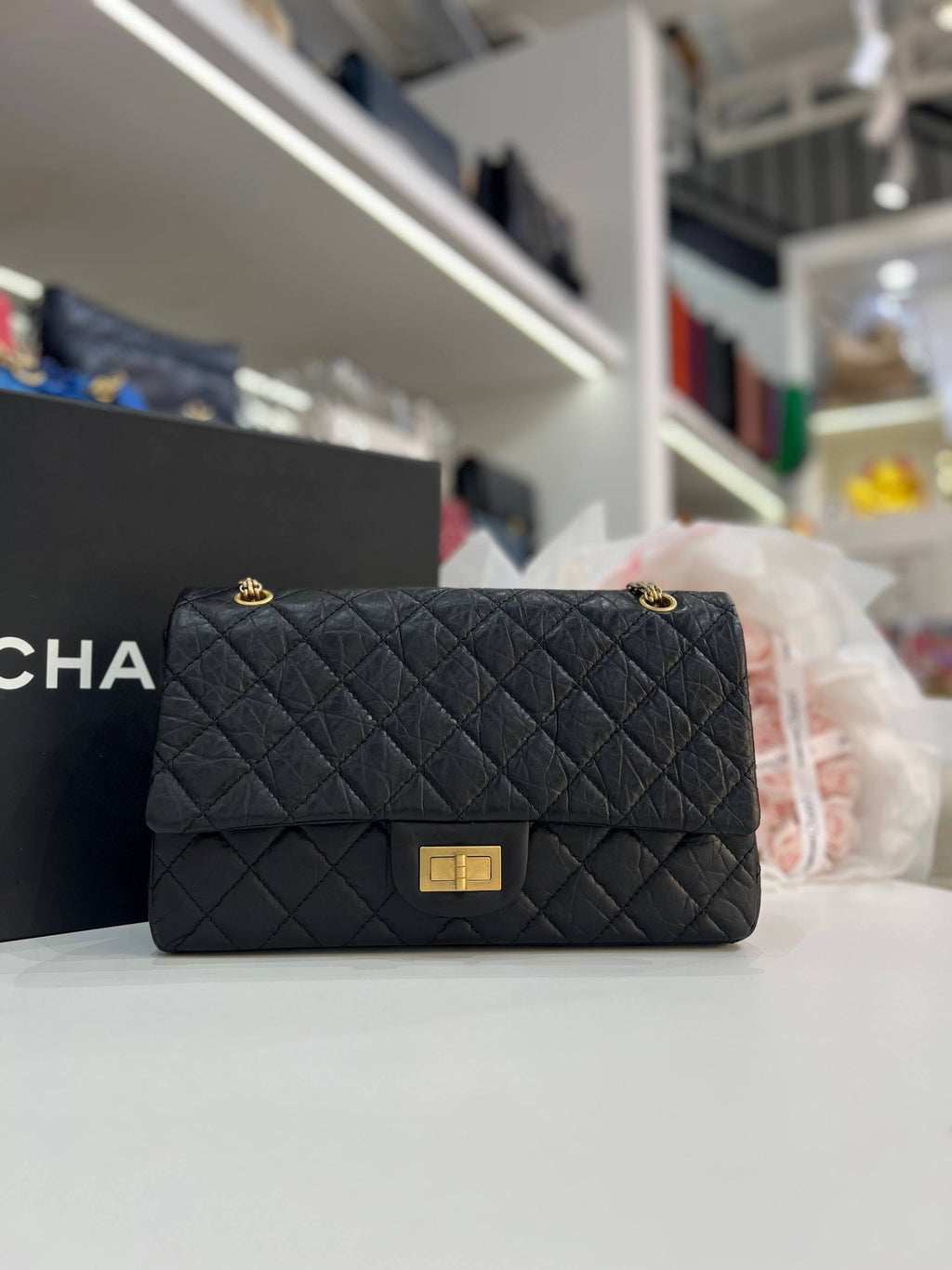 CHANEL 2.55 Reissue Double Flap Bag In Black Aged Calfskin